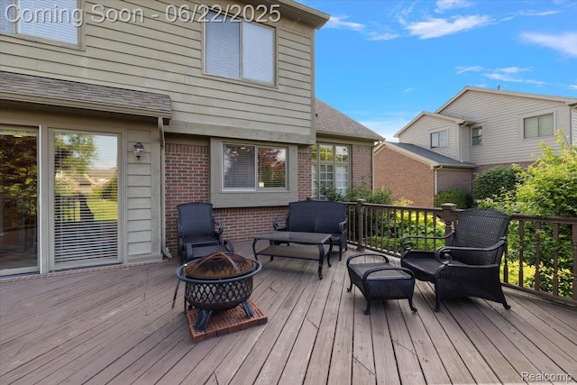 11700 Currin Ct, Plymouth, MI 48170 - wooden terrace with an outdoor living space with a fire pit