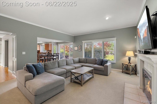 11700 Currin Ct, Plymouth, MI 48170 - living room with light carpet, a tiled fireplace, ornamental molding, and recessed lighting