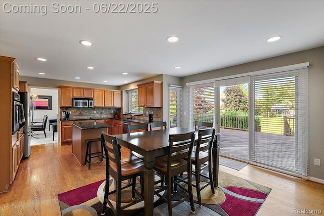 11700 Currin Ct, Plymouth, MI 48170 - dining area featuring plenty of natural light, recessed lighting, and light wood finished floors