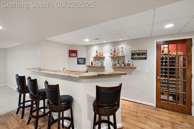 11700 Currin Ct, Plymouth, MI 48170 - indoor wet bar with hardwood / wood-style floors, recessed lighting, and a drop ceiling
