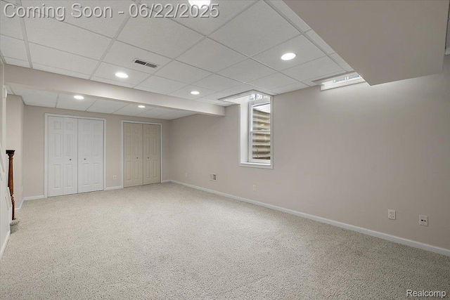 11700 Currin Ct, Plymouth, MI 48170 - finished below grade area featuring carpet, a paneled ceiling, and recessed lighting