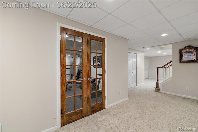 11700 Currin Ct, Plymouth, MI 48170 - unfurnished room with french doors, stairway, a drop ceiling, recessed lighting, and carpet flooring