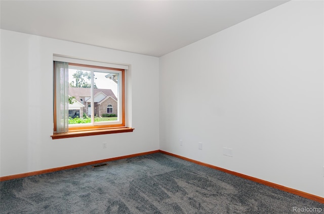 28475 Tiffin Dr, Chesterfield, MI 48047 - unfurnished room with dark colored carpet and baseboards