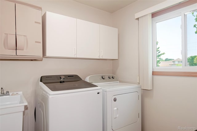 28475 Tiffin Dr, Chesterfield, MI 48047 - laundry room featuring cabinet space and independent washer and dryer