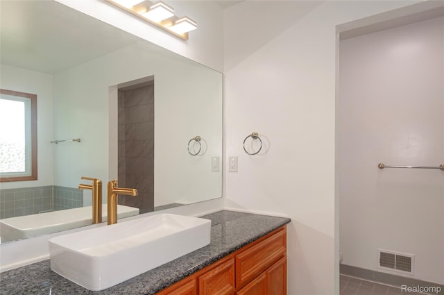 28475 Tiffin Dr, Chesterfield, MI 48047 - bathroom with vanity and tile patterned flooring