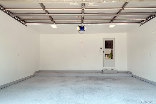 28475 Tiffin Dr, Chesterfield, MI 48047 - garage with a garage door opener and baseboards