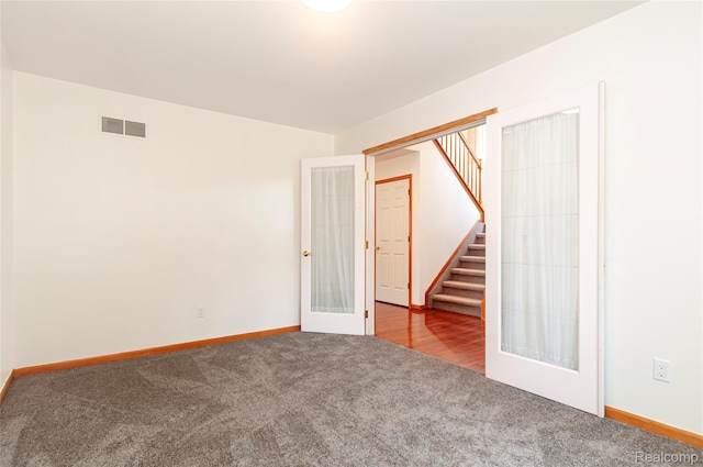 28475 Tiffin Dr, Chesterfield, MI 48047 - empty room featuring carpet floors and stairs