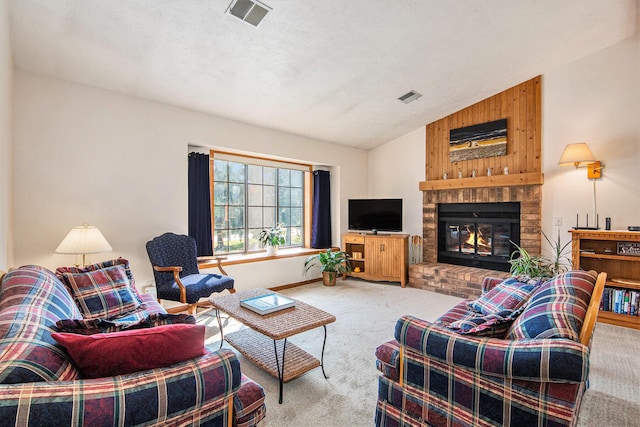 5049 Stauffer Ave SE, Grand Rapids, MI 49508 - carpeted living area featuring lofted ceiling and a fireplace