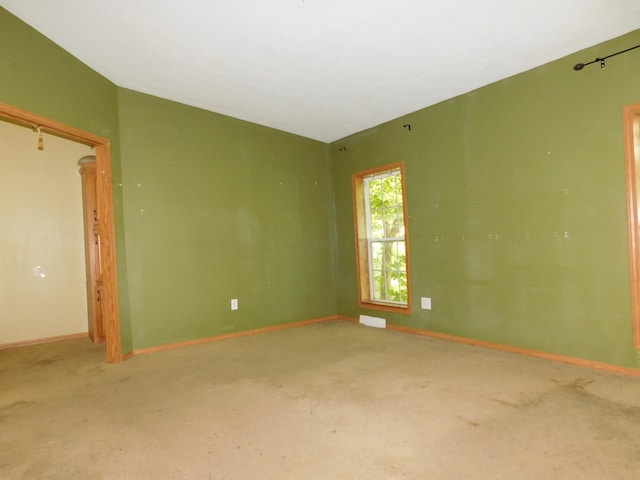 1240 Abbey Ln, Mount Pleasant, MI 48858 - carpeted empty room with baseboards
