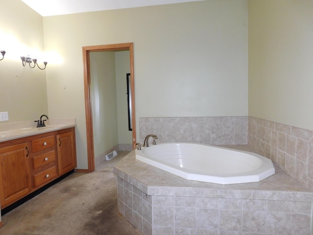 1240 Abbey Ln, Mount Pleasant, MI 48858 - bathroom with vanity and a bath