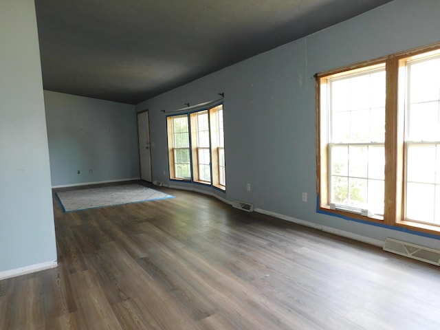1240 Abbey Ln, Mount Pleasant, MI 48858 - spare room with wood finished floors and baseboards