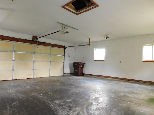 1240 Abbey Ln, Mount Pleasant, MI 48858 - garage featuring a garage door opener