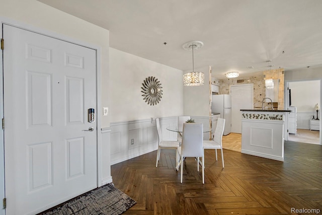 37510 Jefferson Unit 203, Harrison Township, MI 48045 - dining space featuring wainscoting