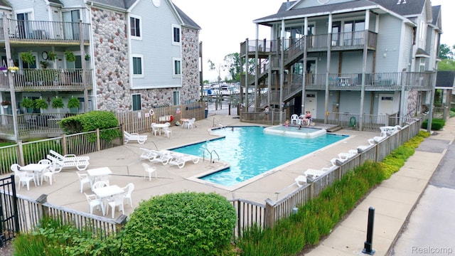 37510 Jefferson Unit 203, Harrison Township, MI 48045 - community pool with a patio