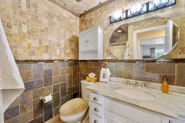 37510 Jefferson Unit 203, Harrison Township, MI 48045 - bathroom featuring tile walls and vanity
