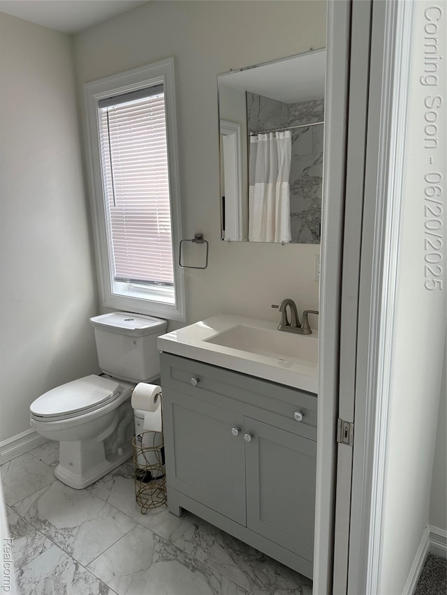 287 Fielding St, Ferndale, MI 48220 - bathroom featuring vanity, marble finish flooring, and a shower with shower curtain