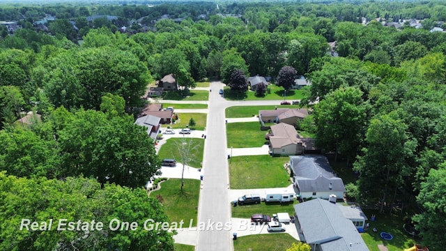 5178 Mangrove Dr, Saginaw, MI 48603 - aerial overview of property's location featuring a forest and nearby suburban area