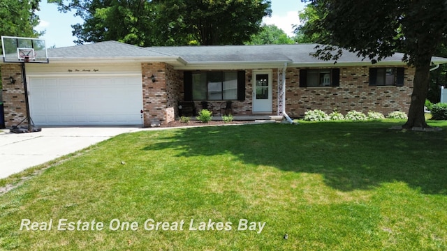 5178 Mangrove Dr, Saginaw, MI 48603 - ranch-style home with driveway, a front yard, a garage, brick siding, and a porch