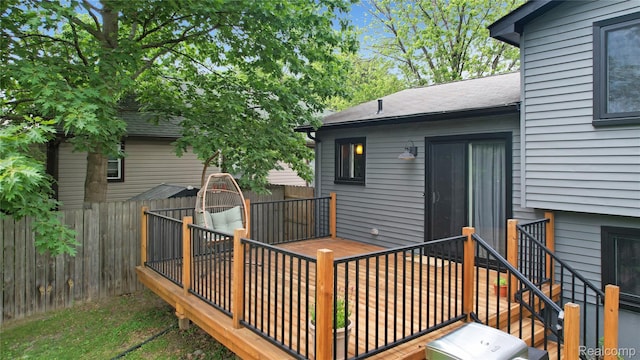 3851 Mapleleaf Rd, Waterford, MI 48328 - wooden deck with a fenced backyard