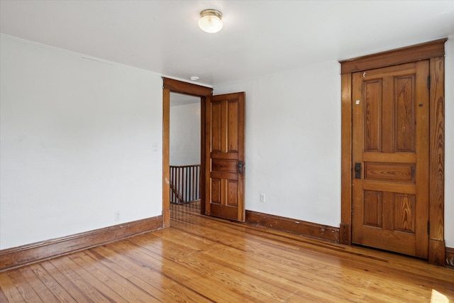 402 Ann Arbor St, Manchester, MI 48158 - unfurnished room featuring light wood finished floors and ornamental molding