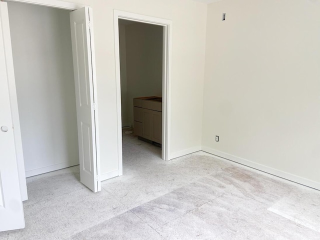 1968 S Shorewood Ln, Holland, MI 49423 - unfurnished bedroom featuring carpet and baseboards