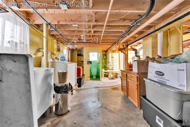 2429 Holmes St, Hamtramck, MI 48212 - below grade area featuring washer and clothes dryer