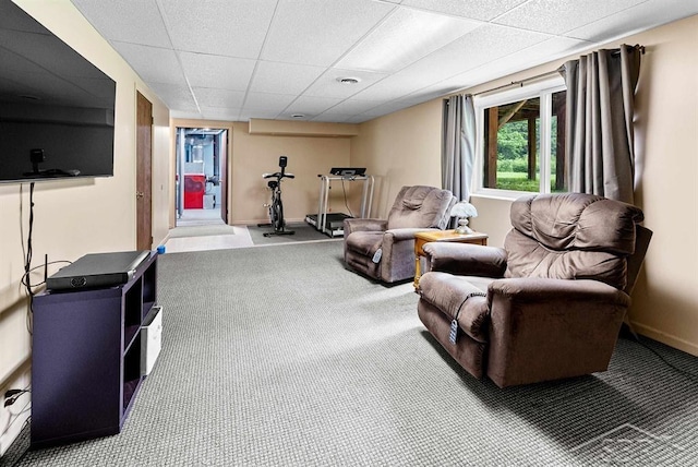 2697 W Olson Rd, Sanford, MI 48657 - living area with a paneled ceiling and carpet floors