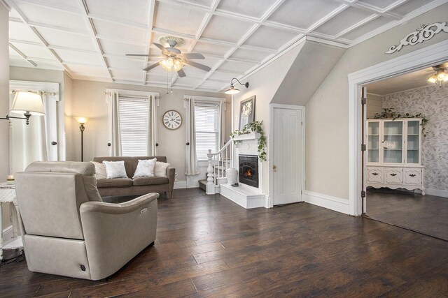105 Clark St, Buchanan, MI 49107 - living area with a ceiling fan, coffered ceiling, dark wood finished floors, and a lit fireplace