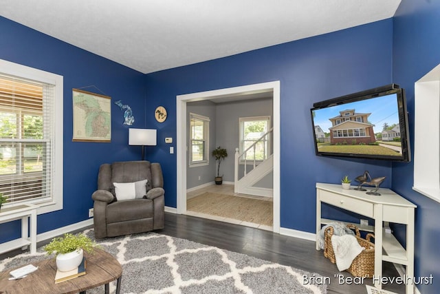 2468 Central Ave SW, Wyoming, MI 49519 - living area with baseboards and wood finished floors