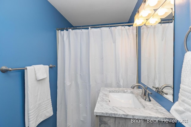 2468 Central Ave SW, Wyoming, MI 49519 - bathroom featuring vanity and curtained shower