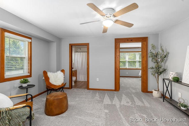 2468 Central Ave SW, Wyoming, MI 49519 - living area with carpet flooring and a ceiling fan
