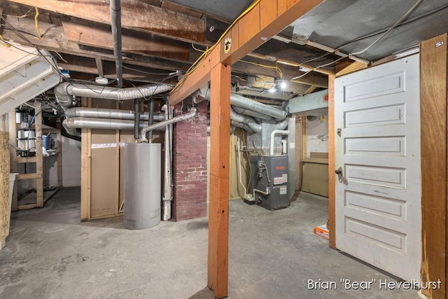 2468 Central Ave SW, Wyoming, MI 49519 - unfinished below grade area featuring water heater and heating unit