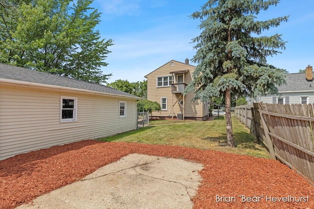 2468 Central Ave SW, Wyoming, MI 49519 - view of yard with a patio and a balcony