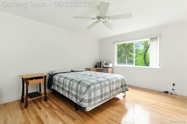 22288 Cass St, Farmington, MI 48335 - bedroom featuring light wood-style floors and ceiling fan