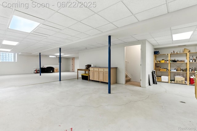 22288 Cass St, Farmington, MI 48335 - below grade area with a paneled ceiling and stairs