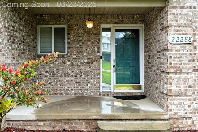 22288 Cass St, Farmington, MI 48335 - entrance to property featuring brick siding