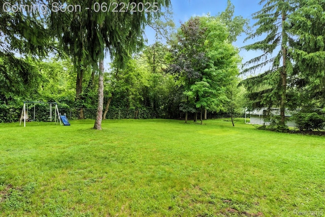 22288 Cass St, Farmington, MI 48335 - view of yard featuring a playground