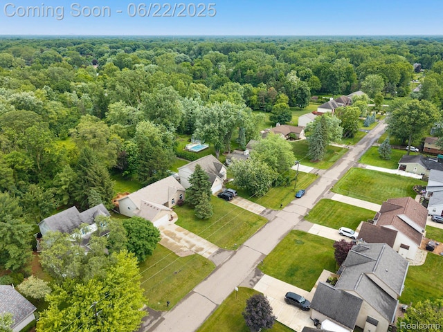 22288 Cass St, Farmington, MI 48335 - aerial view of residential area featuring a heavily wooded area