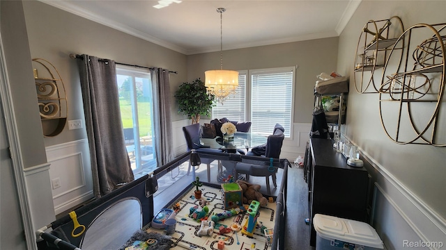 2315 Willow Ln, Grand Blanc, MI 48439 - dining area with wainscoting, a decorative wall, a chandelier, and crown molding