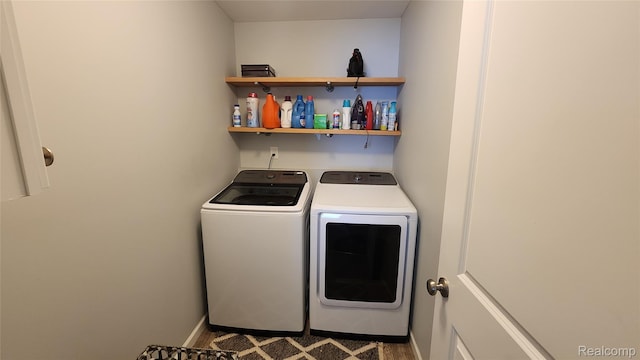 2315 Willow Ln, Grand Blanc, MI 48439 - laundry room with separate washer and dryer and baseboards