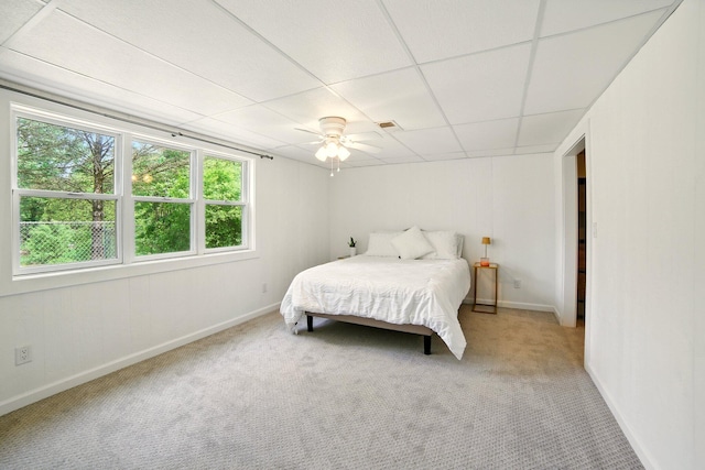 2350 155th Ave, Morley, MI 49336 - bedroom featuring light carpet, ceiling fan, and a paneled ceiling