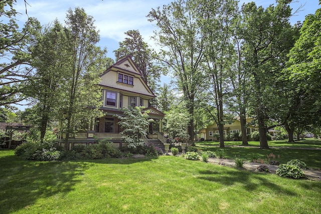 73640 Fulton St, Armada, MI 48005 - view of grassy yard with covered porch