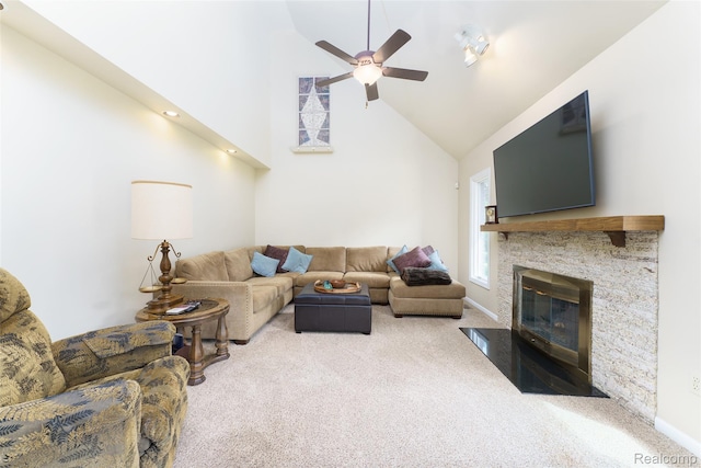 24810 Nottingham Dr, Novi, MI 48374 - living area with carpet, high vaulted ceiling, a ceiling fan, and a fireplace with flush hearth