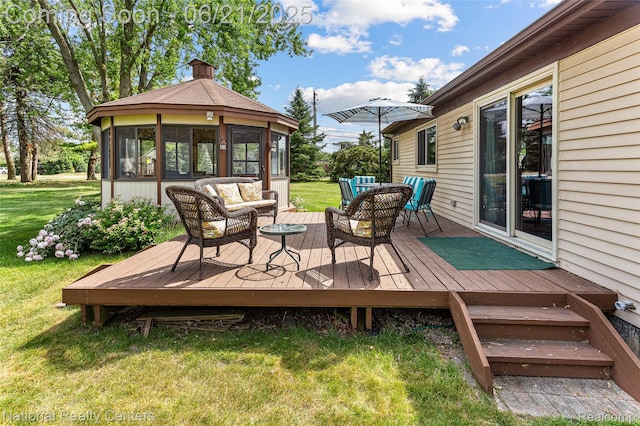 1306 Bishops Ter, Wixom, MI 48393 - wooden deck featuring an outdoor hangout area, a gazebo, and a yard