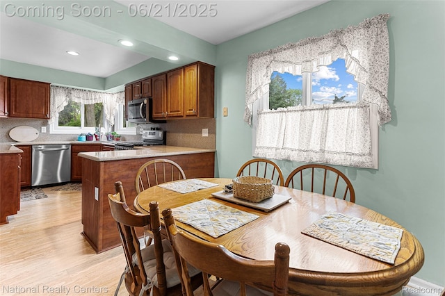 1306 Bishops Ter, Wixom, MI 48393 - dining space featuring light wood finished floors and recessed lighting