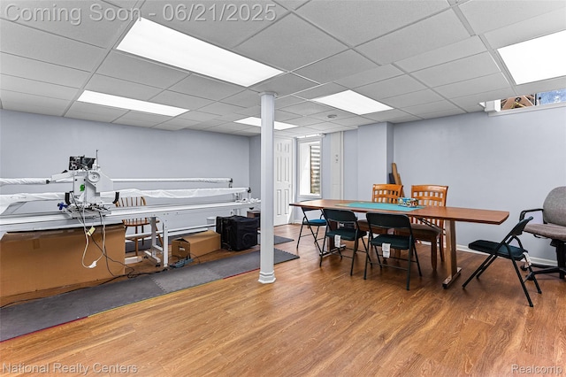 1306 Bishops Ter, Wixom, MI 48393 - dining space featuring wood finished floors and a paneled ceiling
