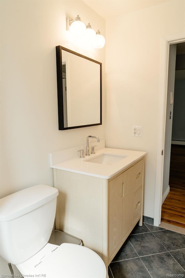 1715 E 14 Mile Rd, Birmingham, MI 48009 - half bathroom featuring vanity and a baseboard heating unit