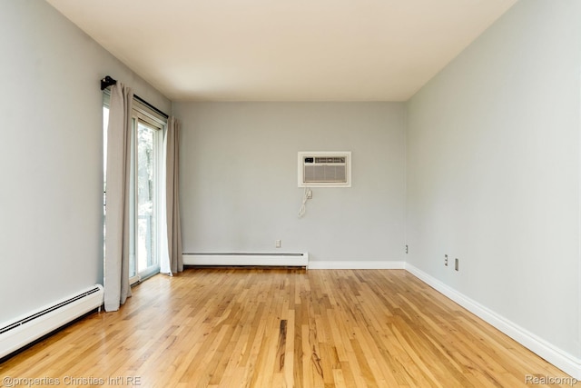 1715 E 14 Mile Rd, Birmingham, MI 48009 - empty room featuring a baseboard heating unit, a wall mounted AC, and light wood finished floors