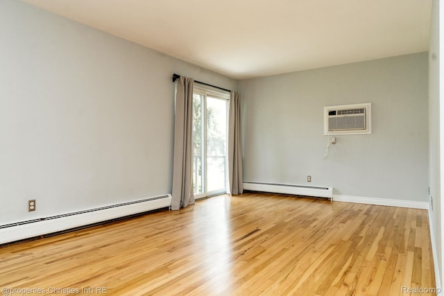 1715 E 14 Mile Rd, Birmingham, MI 48009 - spare room with a baseboard radiator, a wall mounted AC, and light wood-type flooring