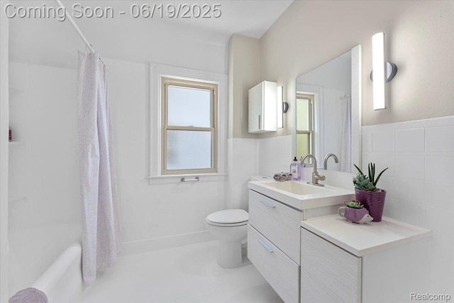 243 2nd St, Brownstown, MI 48192 - bathroom with vanity and shower / tub combo with curtain